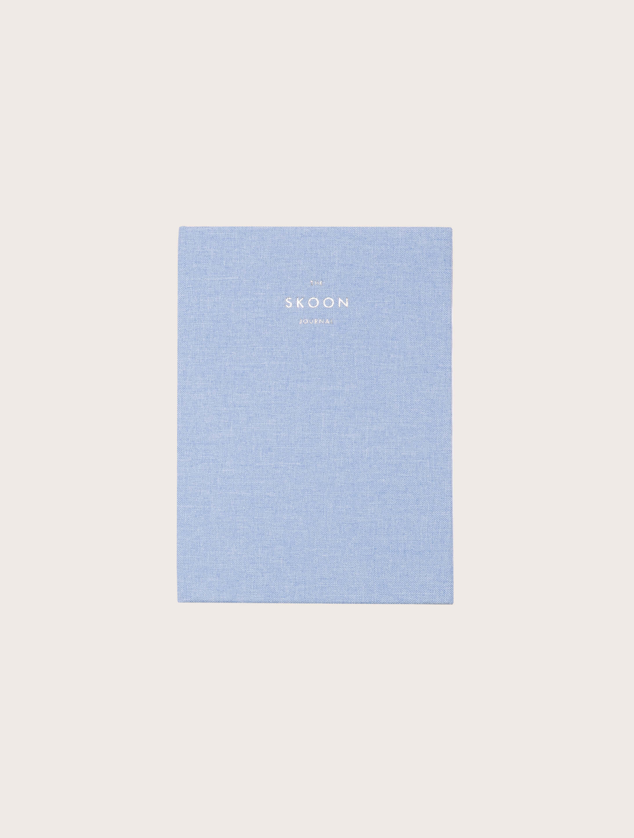 blue hardcover Skoon journal and planner for writing by TINT LAB