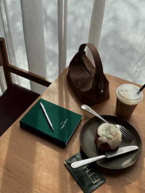 green hardcover Skoon journal for writing by TINT LAB