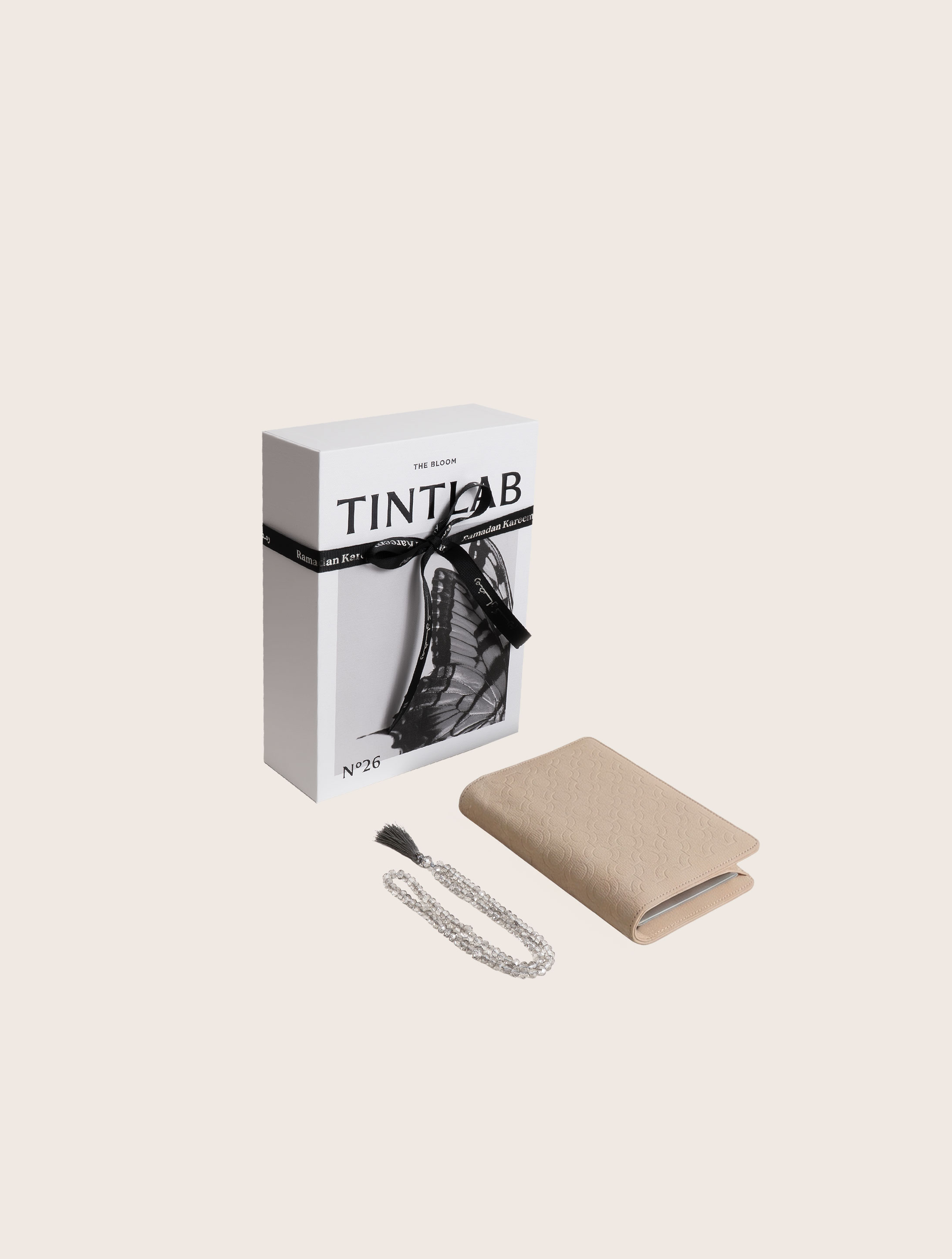 Beige textured leather notebook sleeve and Cover, Quran Sleeve and Cover, embossed geometric pattern and a silver metal logo tag with chain