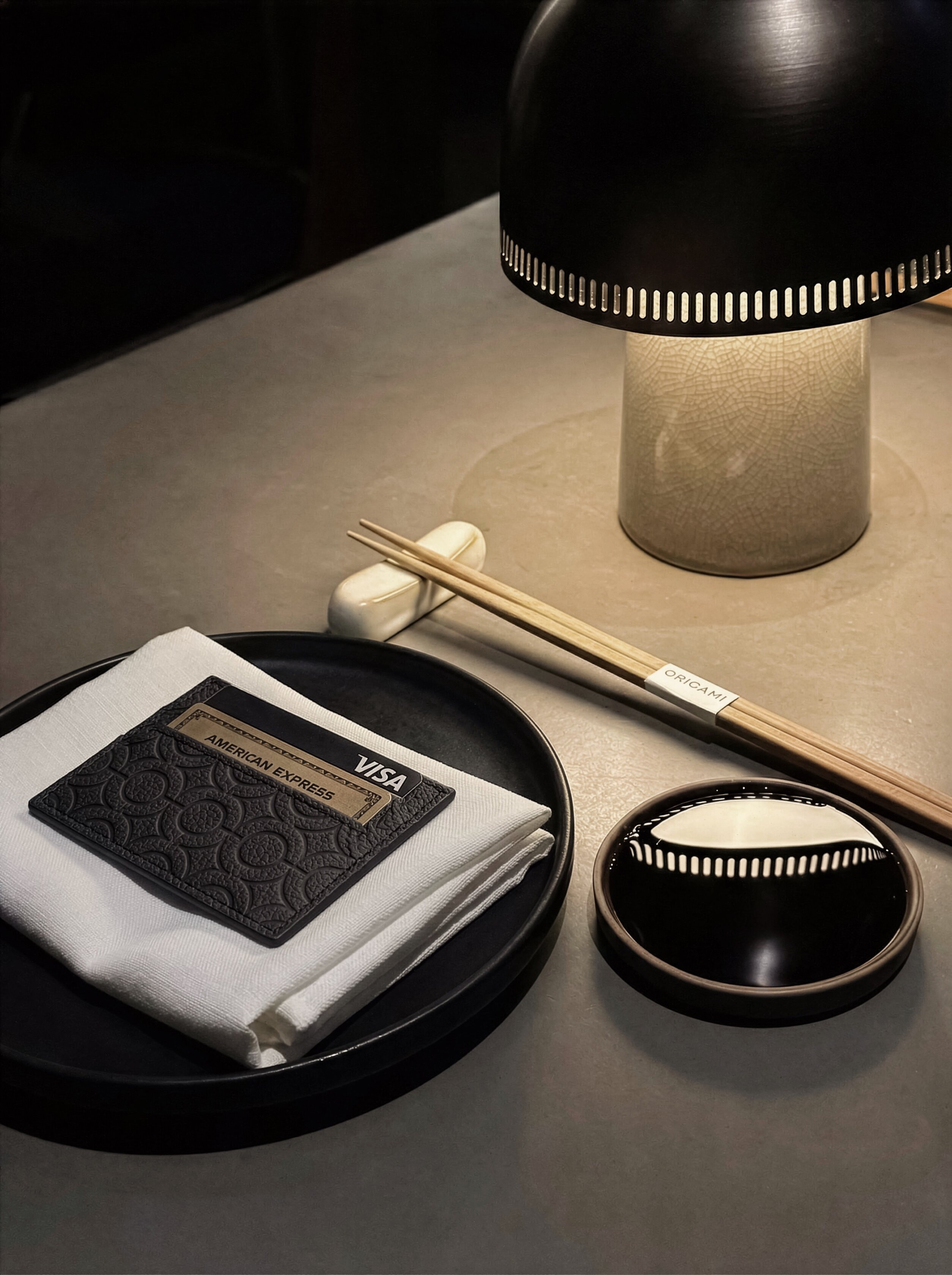 black textured leather cardholder wallet, embossed geometric pattern