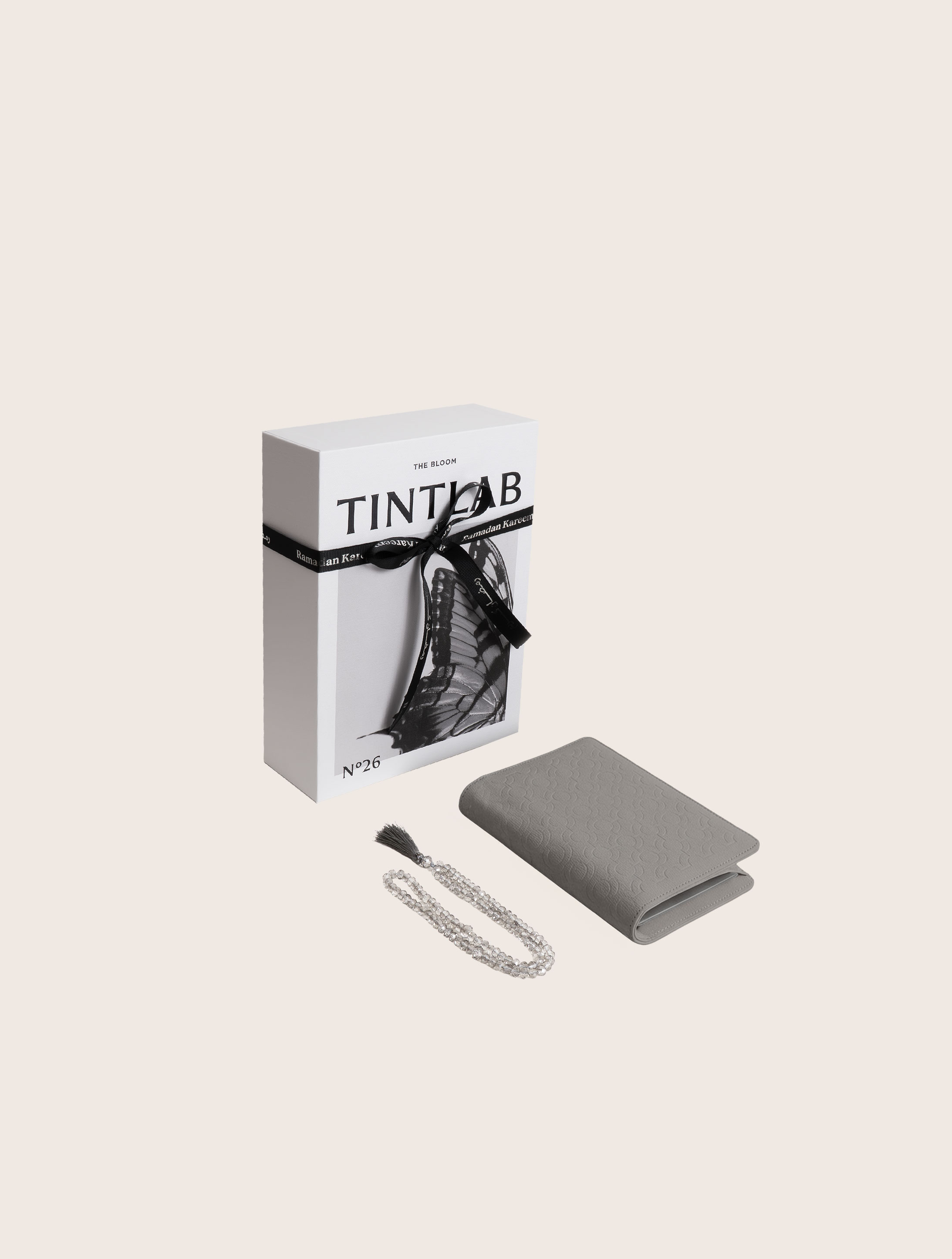 Grey textured leather notebook sleeve and Cover, Quran Sleeve and Cover, embossed geometric pattern and a silver metal logo tag with chain