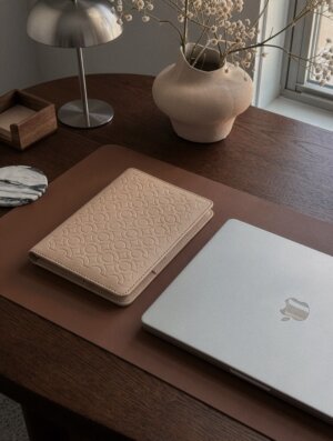 Beige textured leather notebook sleeve and Cover, Quran Sleeve and Cover, embossed geometric pattern and a silver metal logo tag with chain