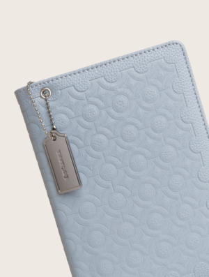 Blue textured leather notebook sleeve and Cover, Quran Sleeve and Cover, embossed geometric pattern and a silver metal logo tag with chain