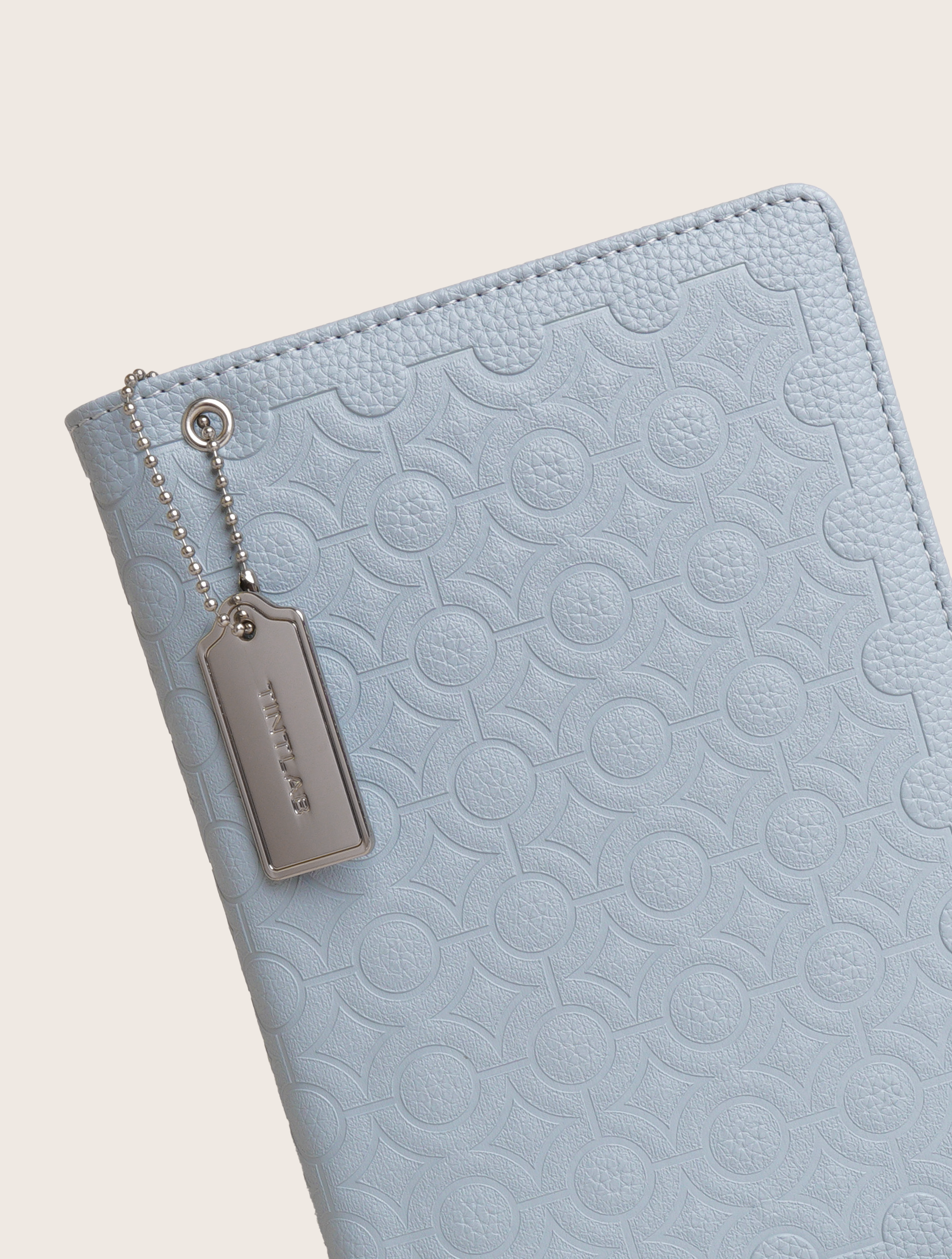 Blue textured leather notebook sleeve and Cover, Quran Sleeve and Cover, embossed geometric pattern and a silver metal logo tag with chain