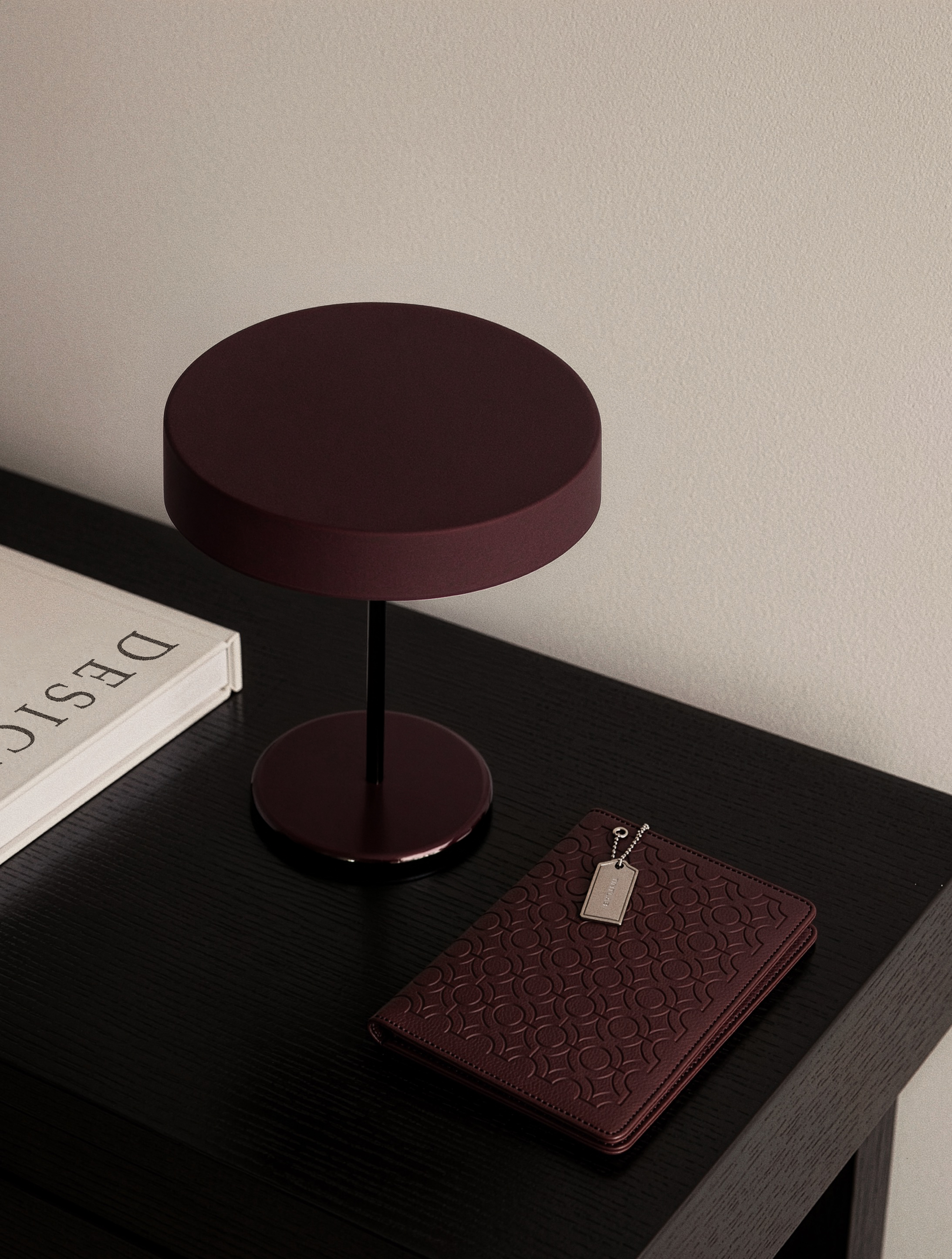 Burgundy textured leather notebook sleeve and Cover, Quran Sleeve and Cover, embossed geometric pattern and a silver metal logo tag with chain