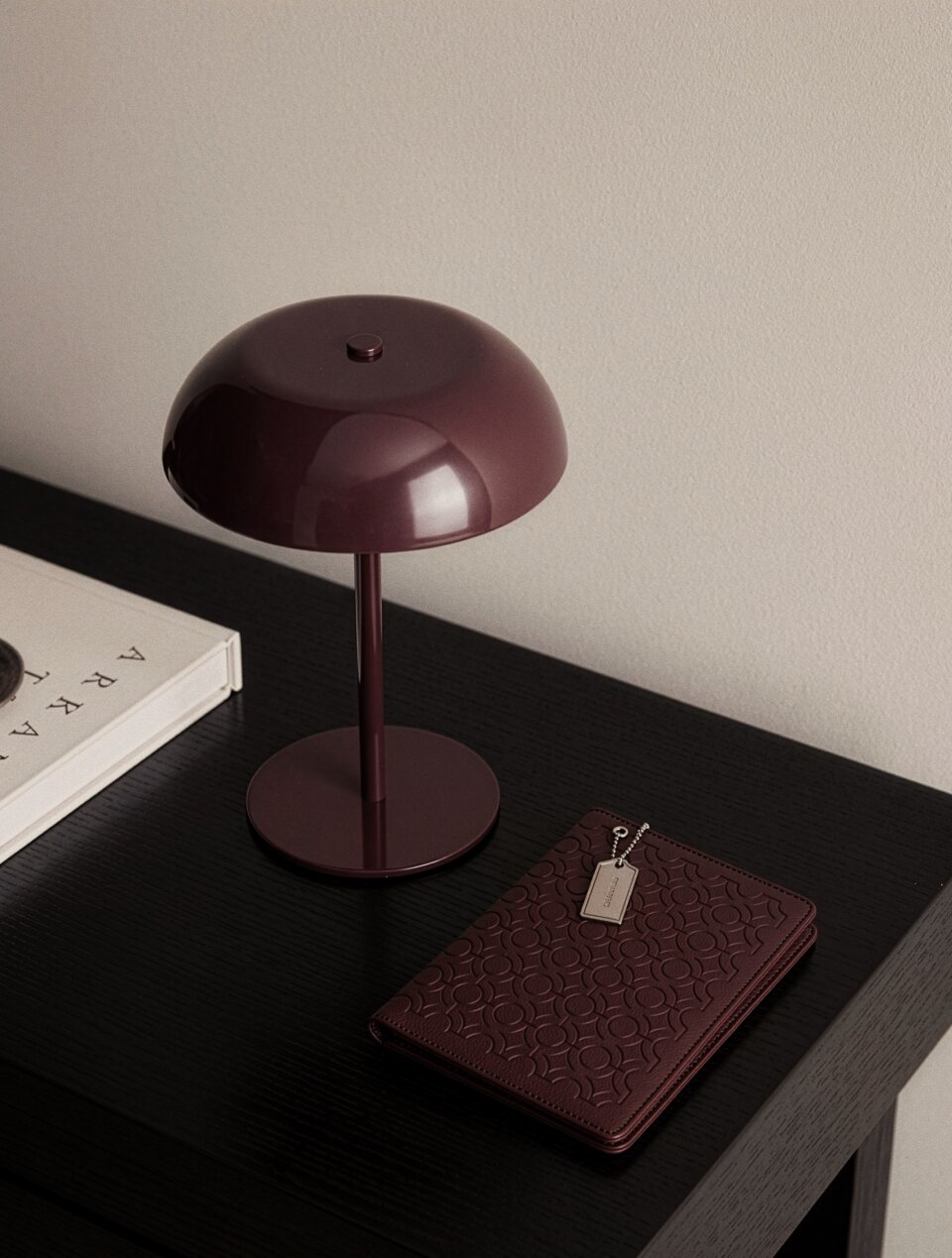 Burgundy textured leather notebook sleeve and Cover, Quran Sleeve and Cover, embossed geometric pattern and a silver metal logo tag with chain