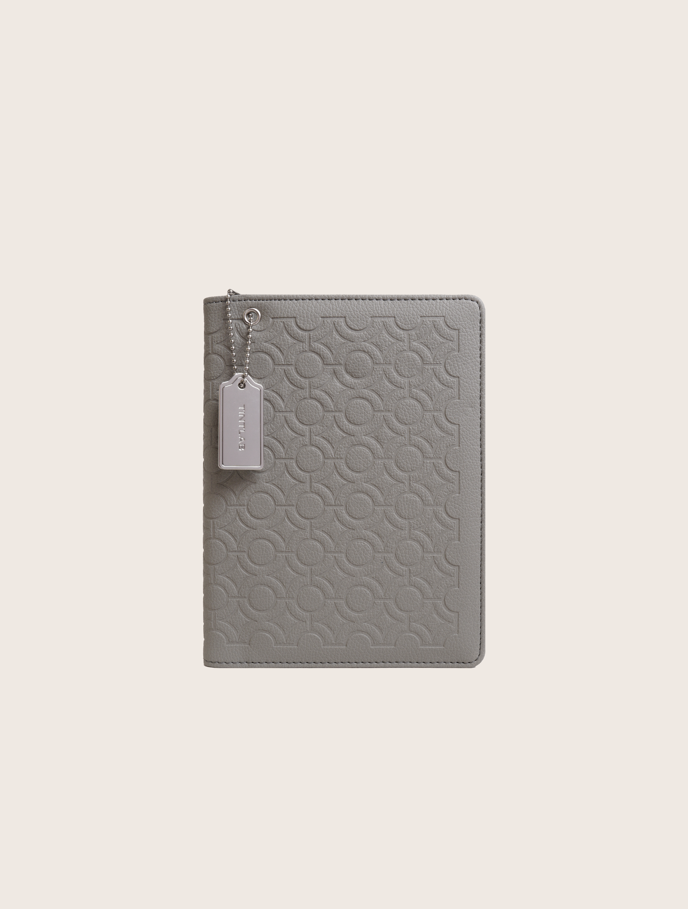 Grey textured leather notebook sleeve and Cover, Quran Sleeve and Cover, embossed geometric pattern and a silver metal logo tag with chain