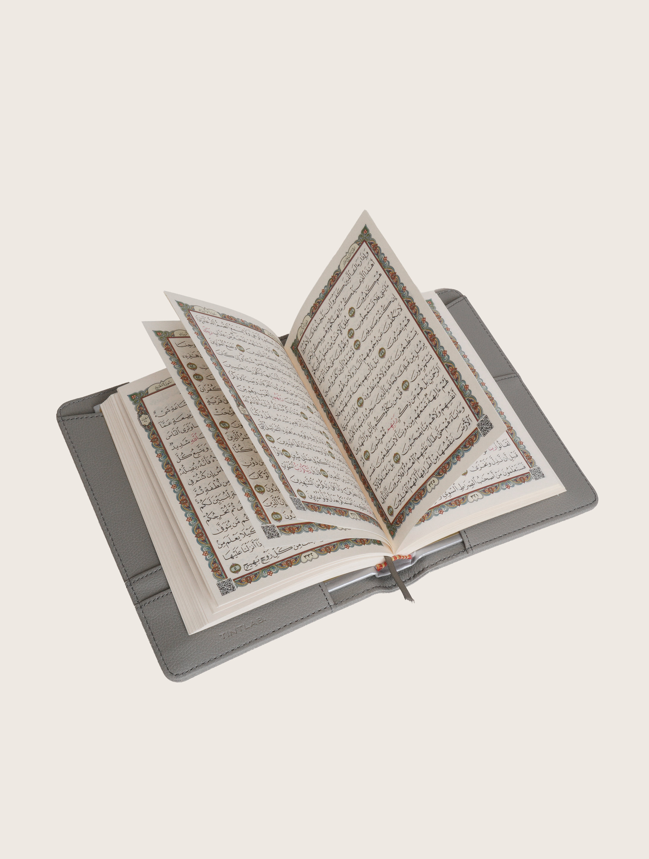 Grey textured leather notebook sleeve and Cover, Quran Sleeve and Cover, embossed geometric pattern and a silver metal logo tag with chain