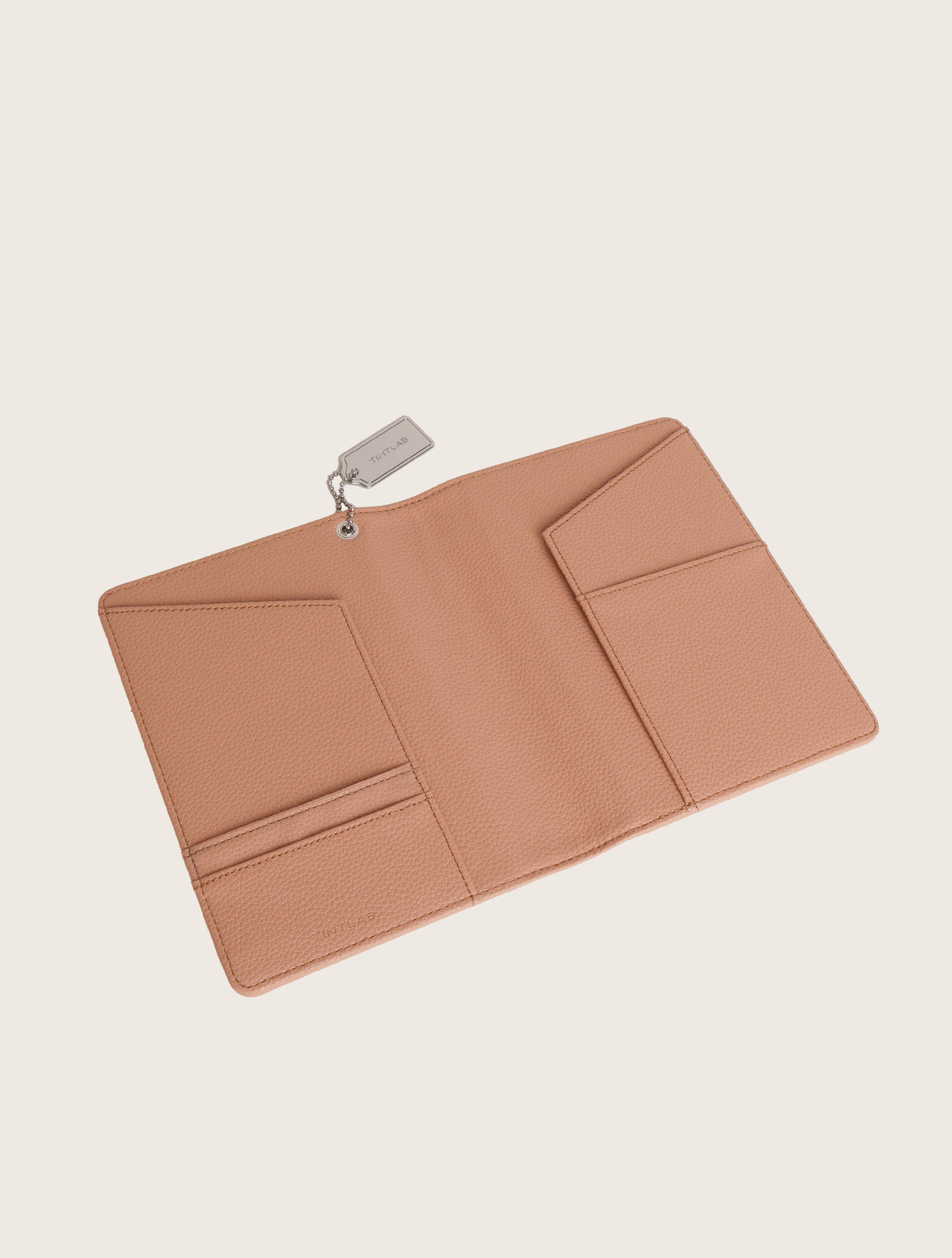 Clay brown textured leather notebook sleeve and Cover, Quran Sleeve and Cover, embossed geometric pattern and a silver metal logo tag with chain