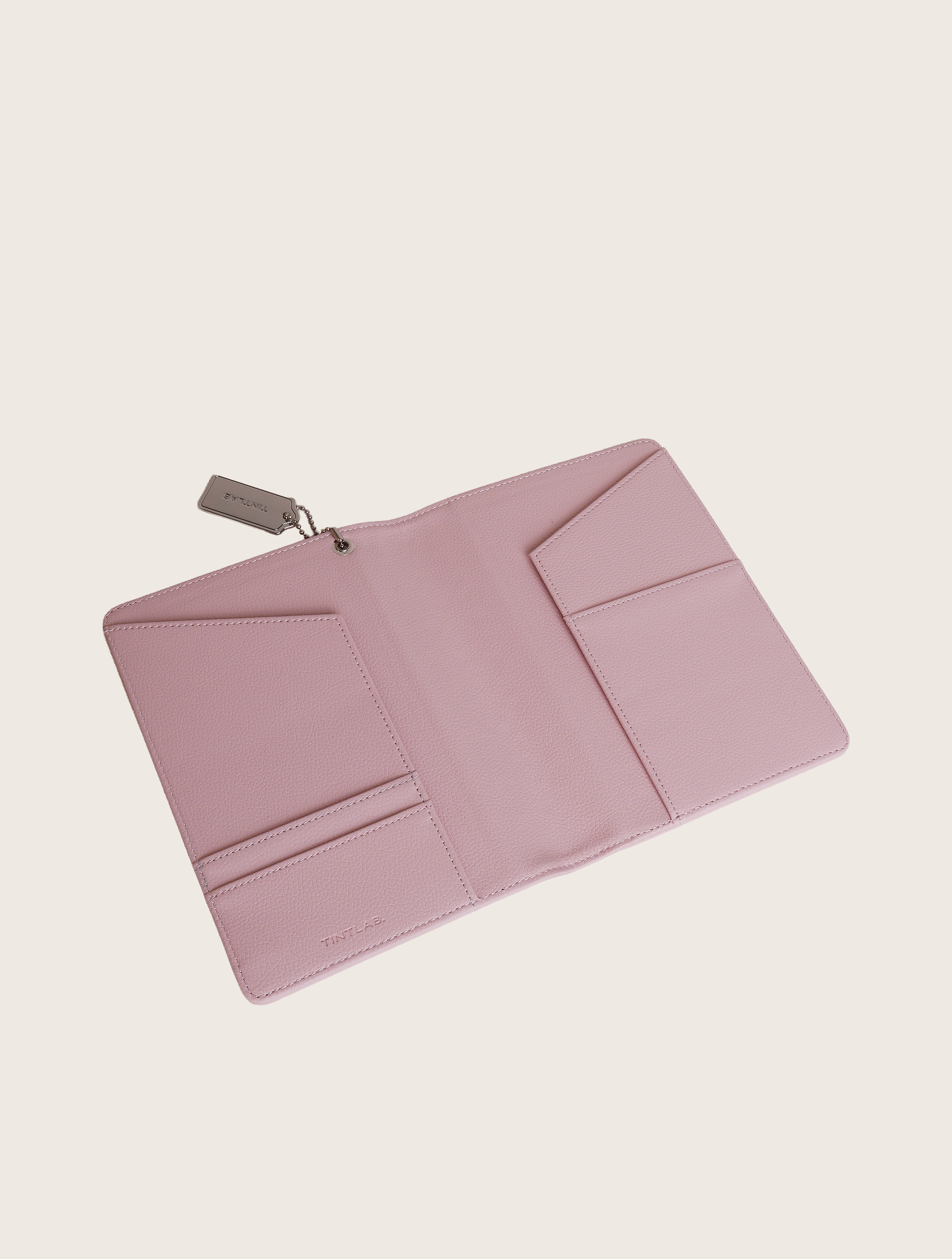 Pink textured leather notebook sleeve and Cover, Quran Sleeve and Cover, embossed geometric pattern and a silver metal logo tag with chain